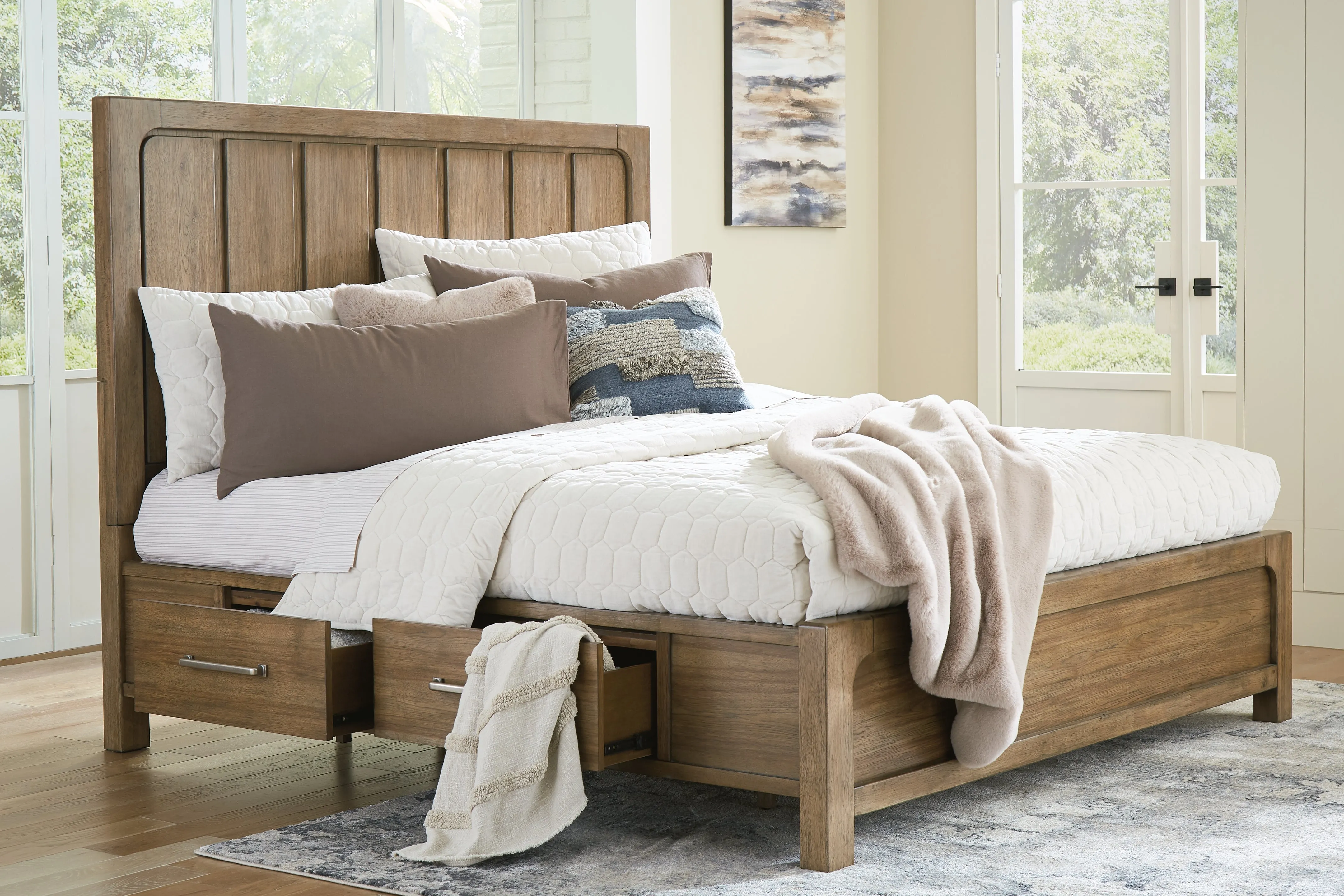 Cabalynn California King Panel Bed with Storage with Mirrored Dresser, Chest and Nightstand in Light Brown
