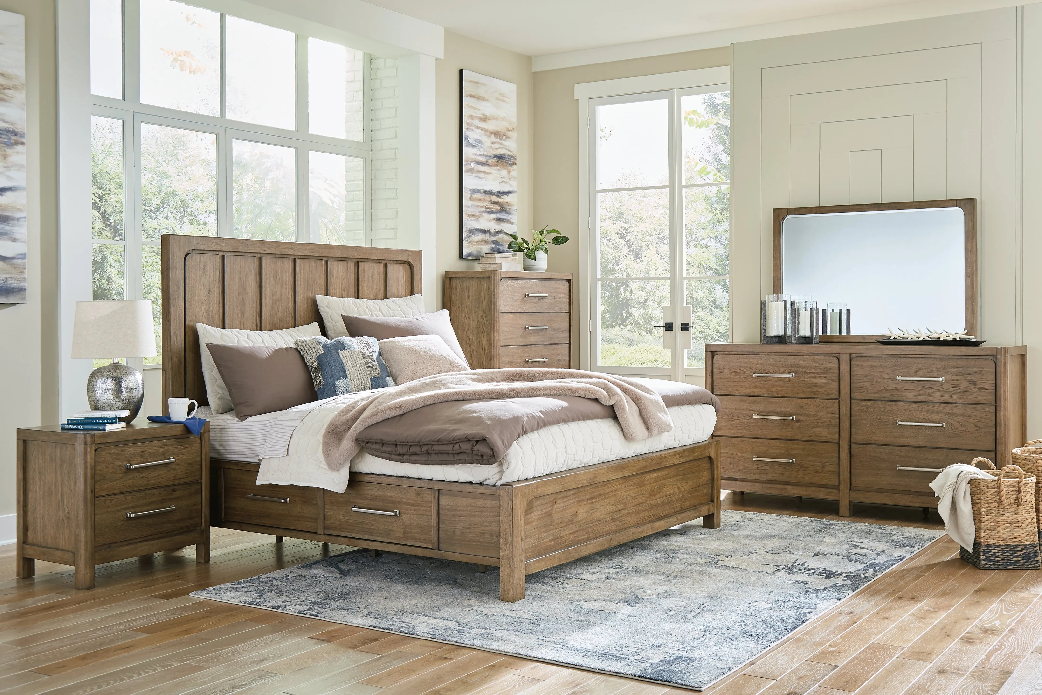 Cabalynn California King Panel Bed with Storage with Mirrored Dresser, Chest and Nightstand in Light Brown