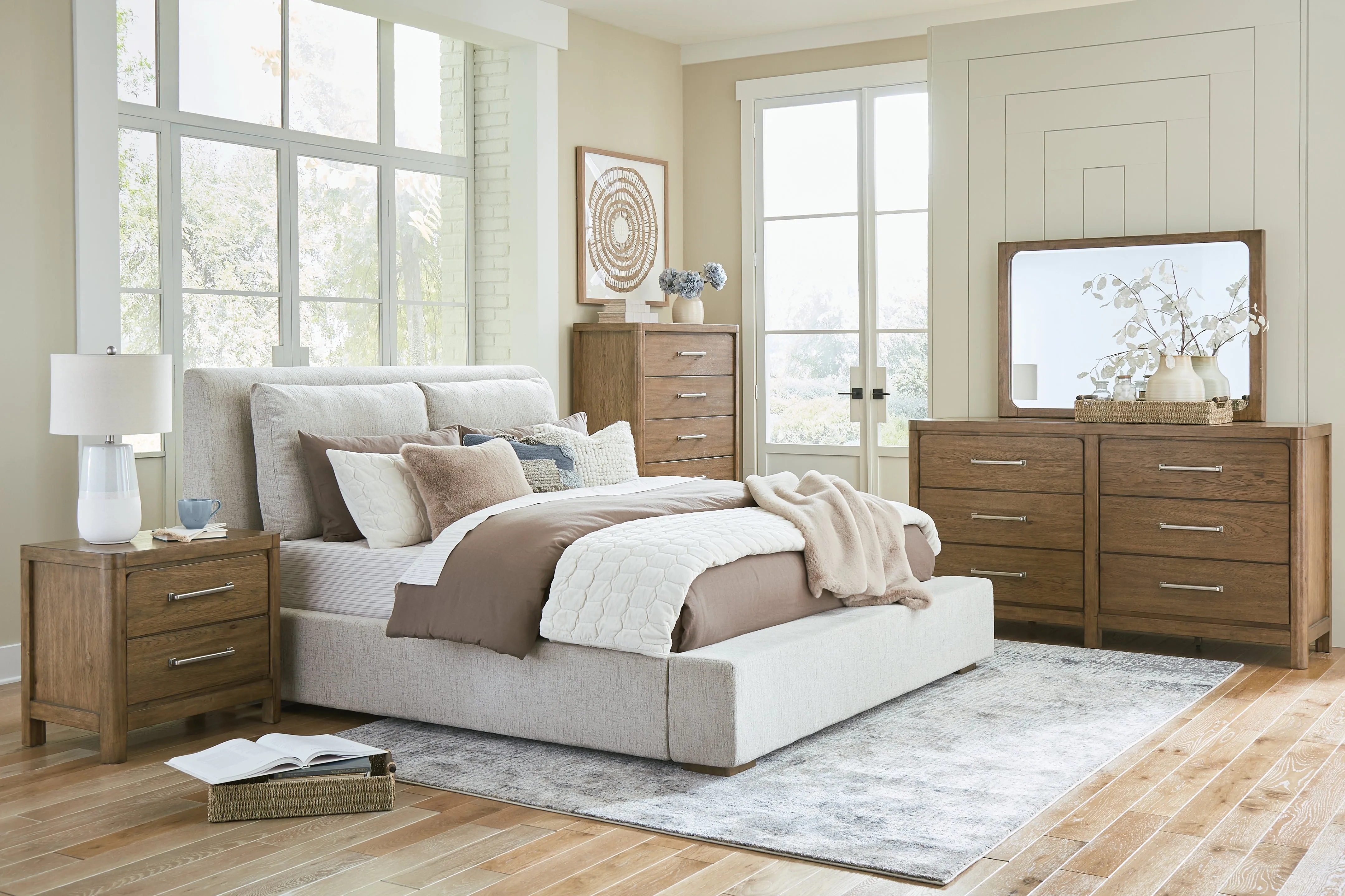 Cabalynn California King Upholstered Bed with Mirrored Dresser, Chest and Nightstand in Light Brown