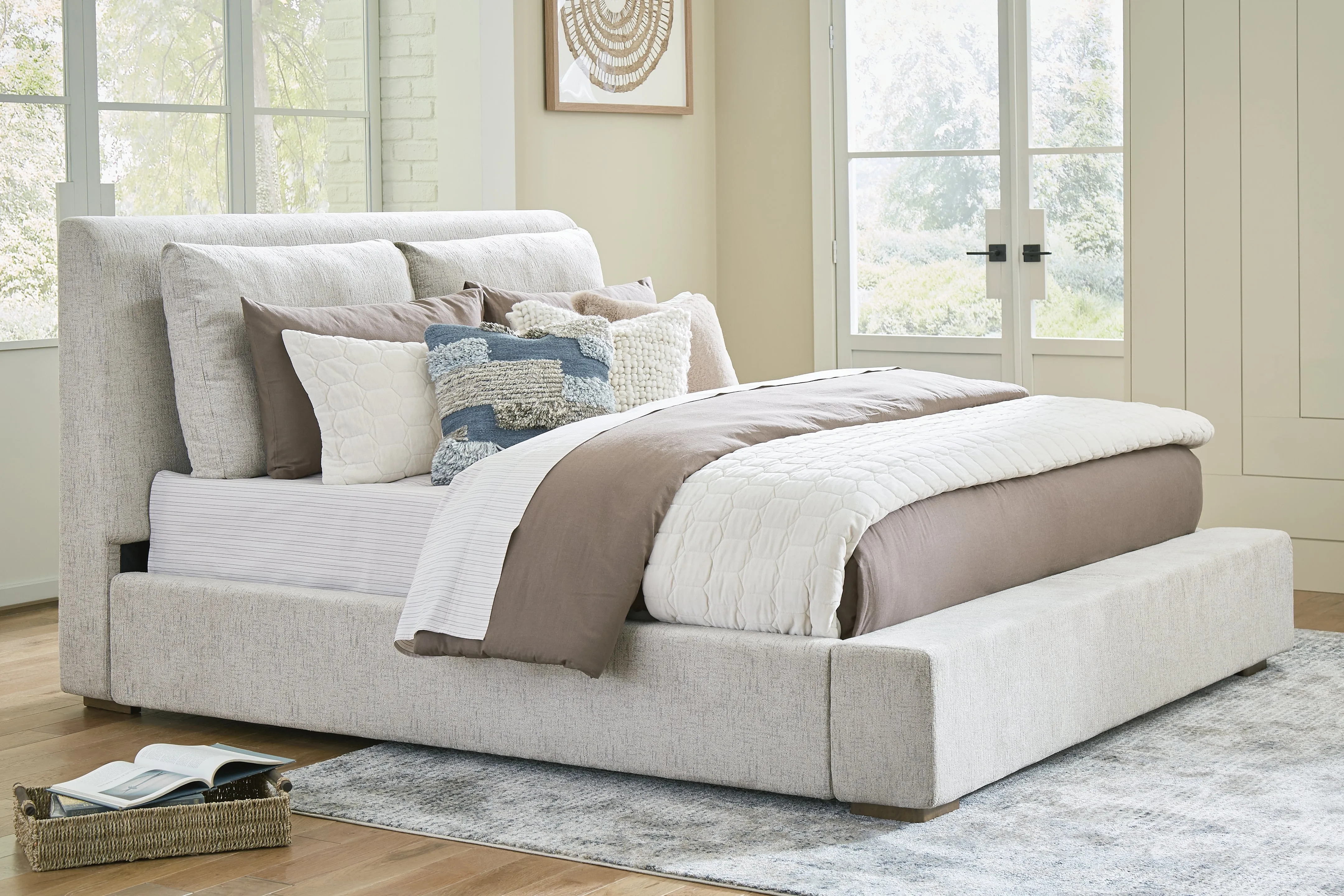 Cabalynn California King Upholstered Bed with Mirrored Dresser, Chest and Nightstand in Light Brown