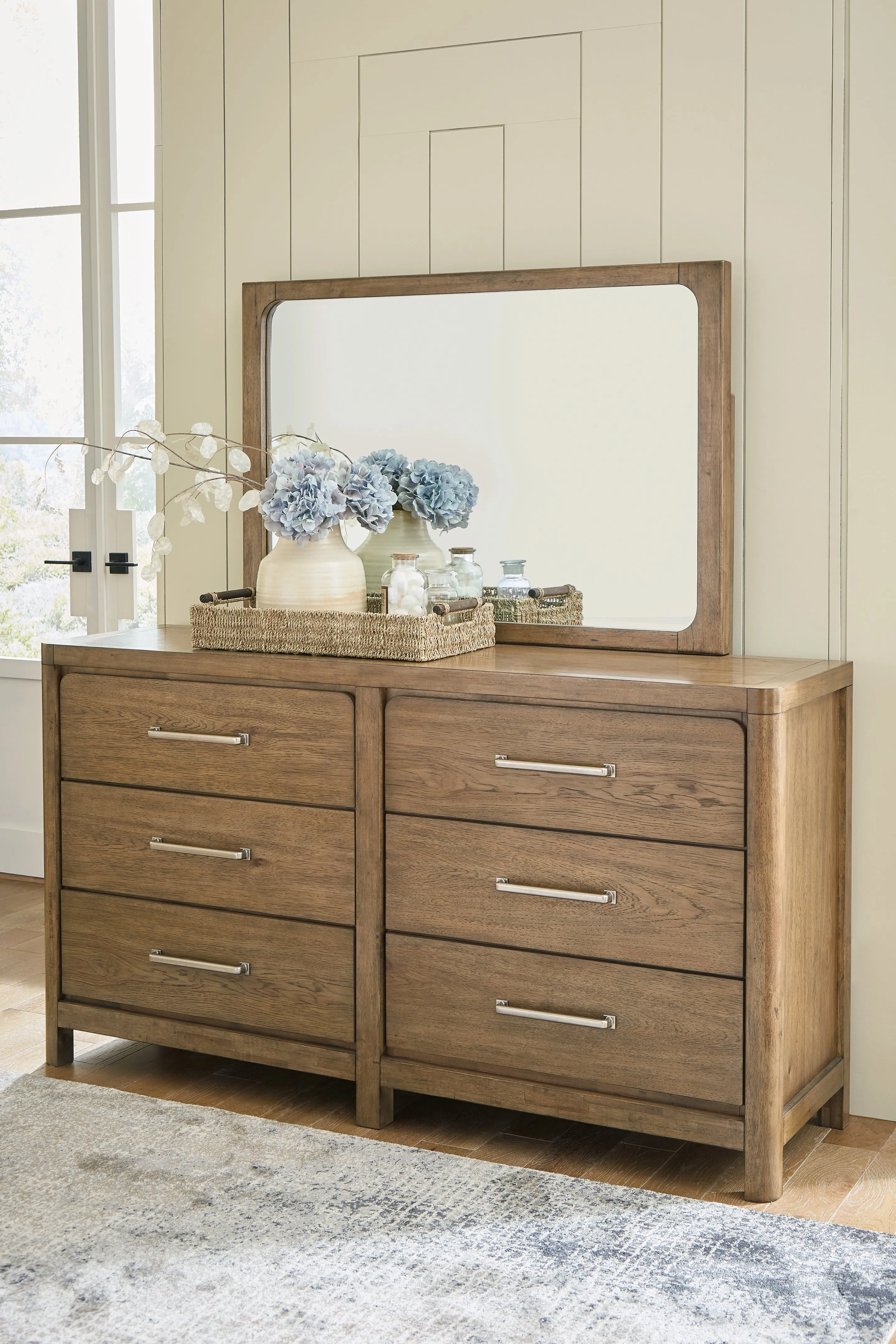 Cabalynn Queen Panel Bed with Storage with Mirrored Dresser in Light Brown
