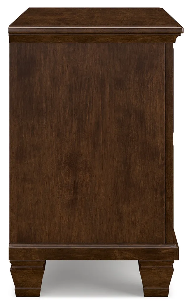 Danabrin King Panel Bed with Mirrored Dresser and Nightstand in Brown