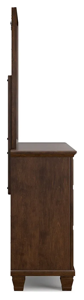 Danabrin King Panel Bed with Mirrored Dresser and Nightstand in Brown