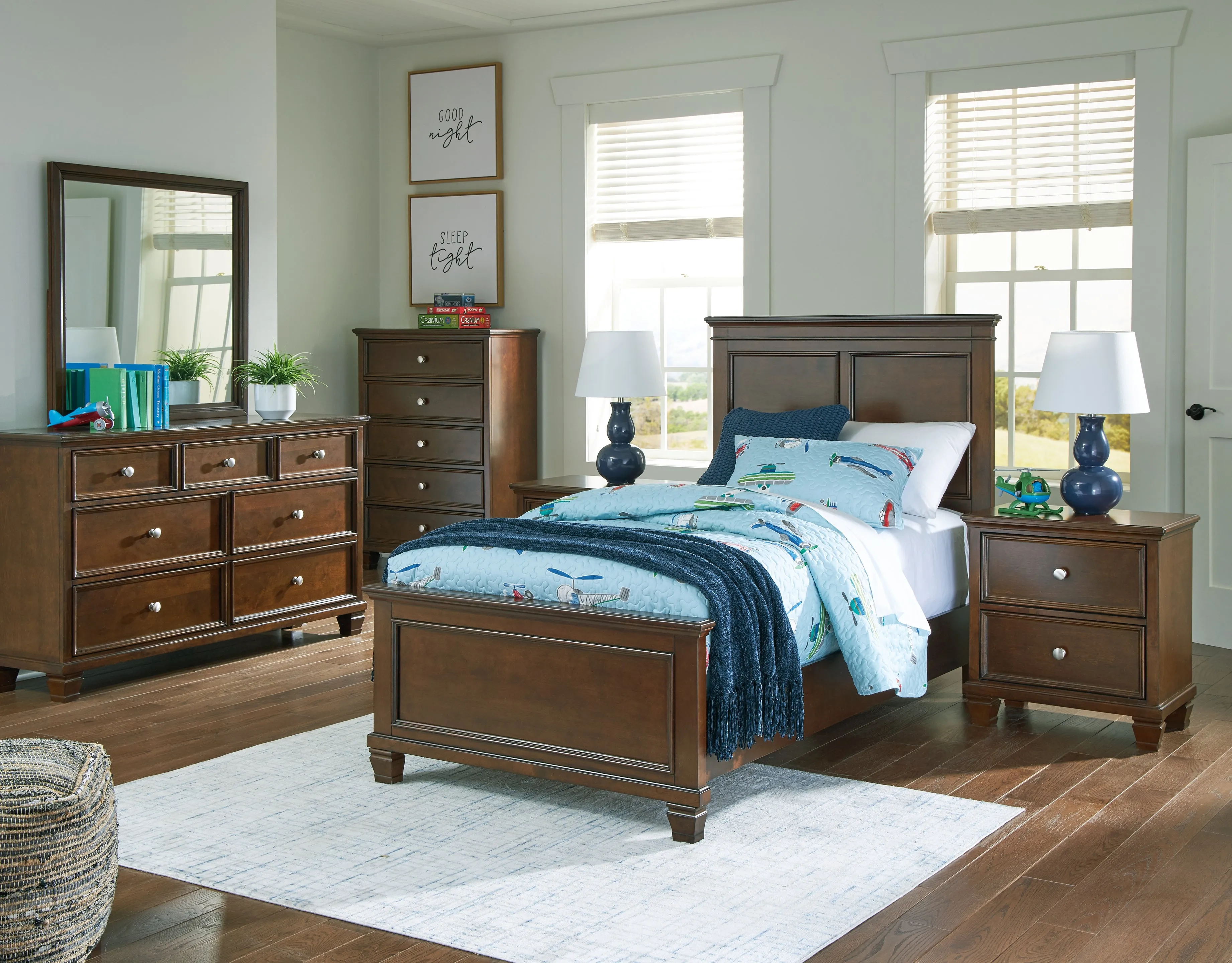 Danabrin Twin Panel Bed with Mirrored Dresser and Chest in Brown