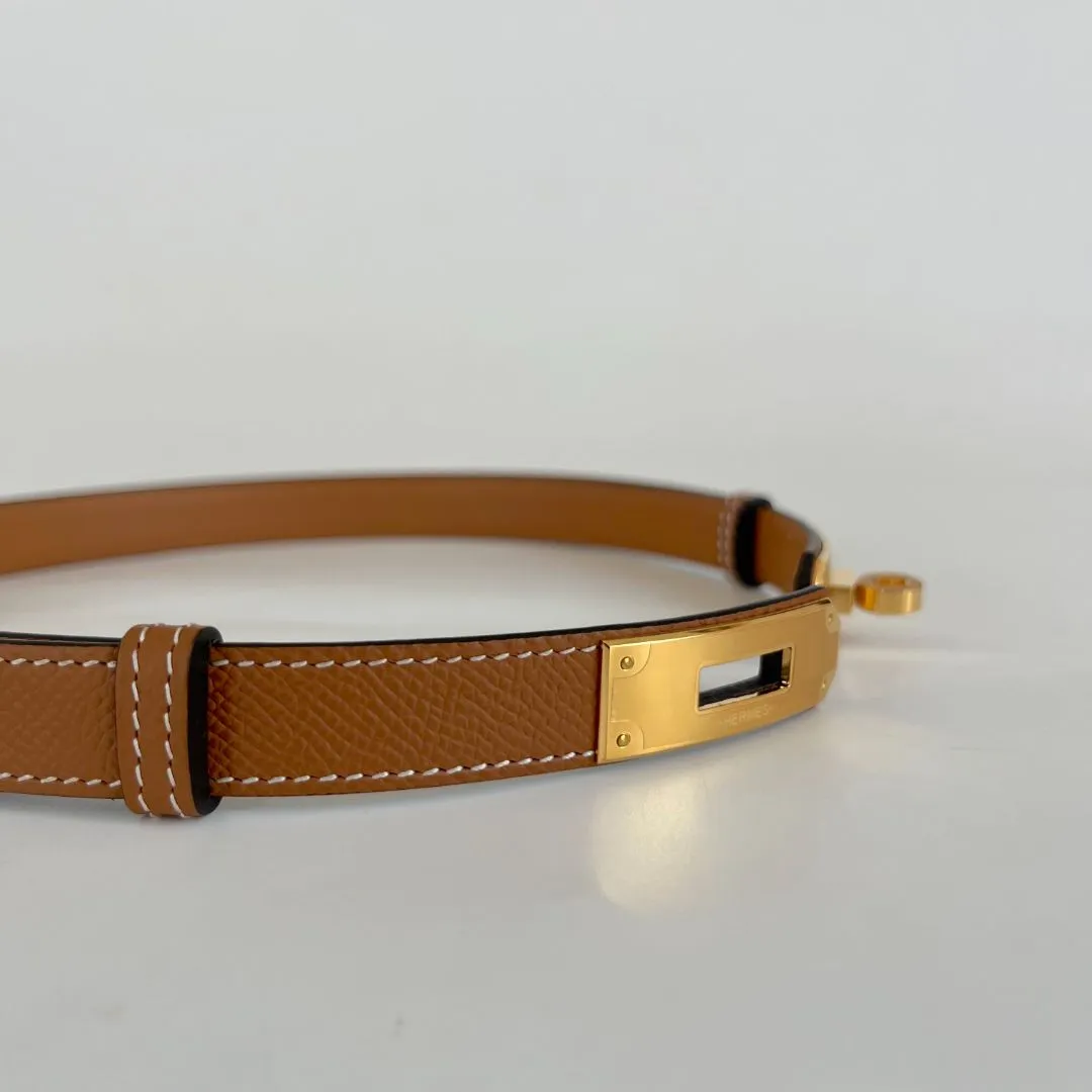 Hermès belt in gold epsom with gold-plated Kelly buckle.