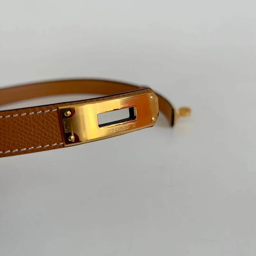 Hermès belt in gold epsom with gold-plated Kelly buckle.