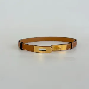 Hermès belt in gold epsom with gold-plated Kelly buckle.
